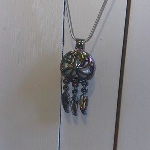 Stunning dream catcher locket pendant with two pearls inside